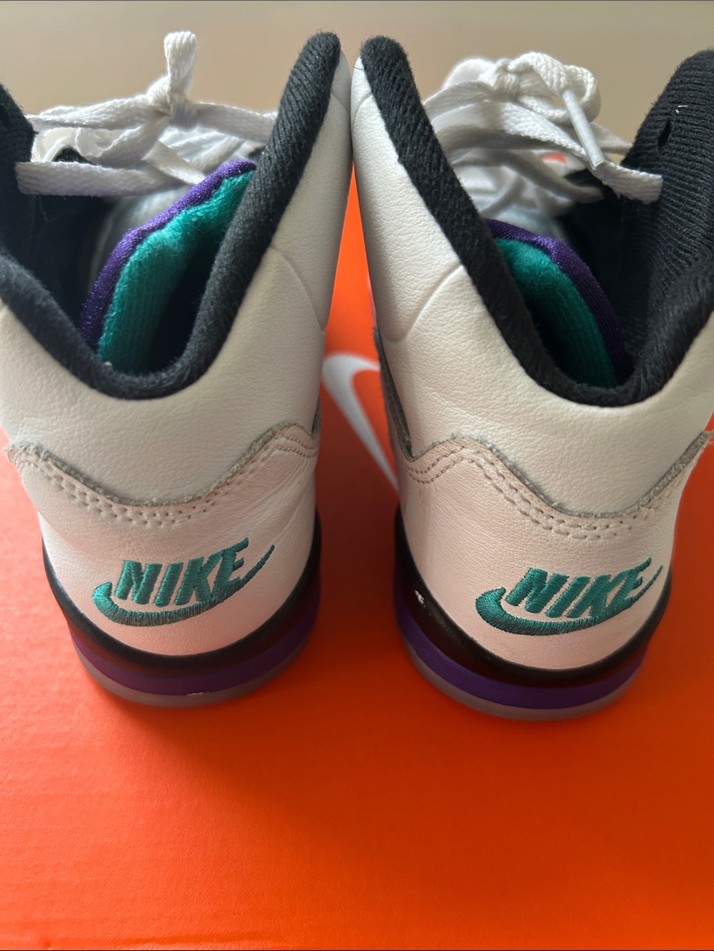Nike Kids White Sneakers with Teal & Purple Accents